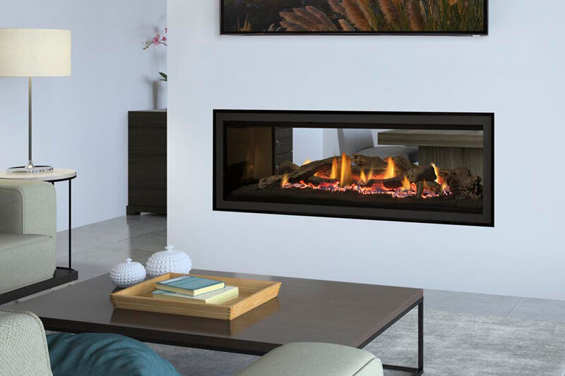 A wide linear gas fireplace set into a living room wall.
